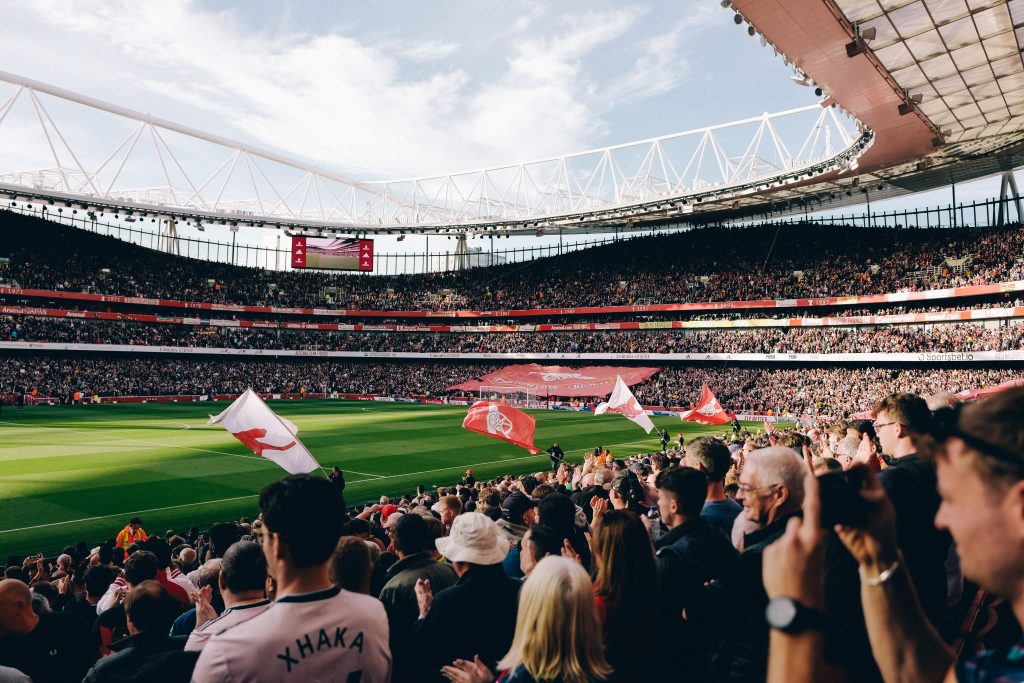 Arsenal fans Celebrating a goal at the Emirates Stadium
