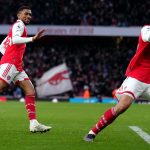Reiss Nelson and Saliba celebrating last minute winner