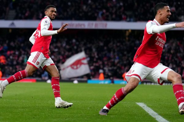 Reiss Nelson and Saliba celebrating last minute winner