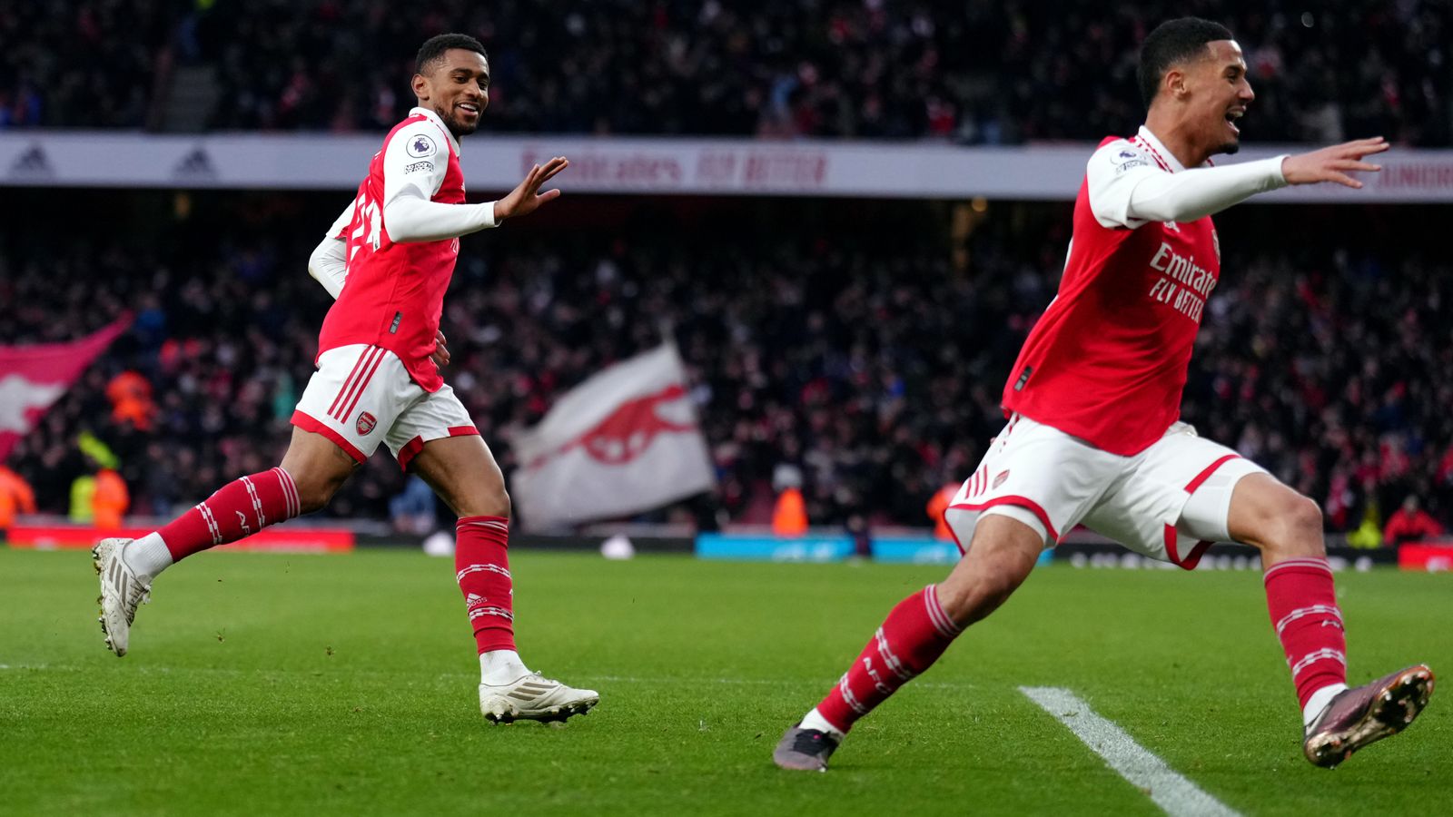 Reiss Nelson and Saliba celebrating last minute winner